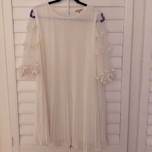 The clothing company brand - size L - perfect for wedding festivities